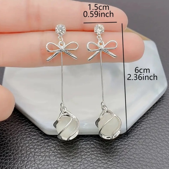 Elegant Silver Bow Drop Earrings - Picture 5 of 5